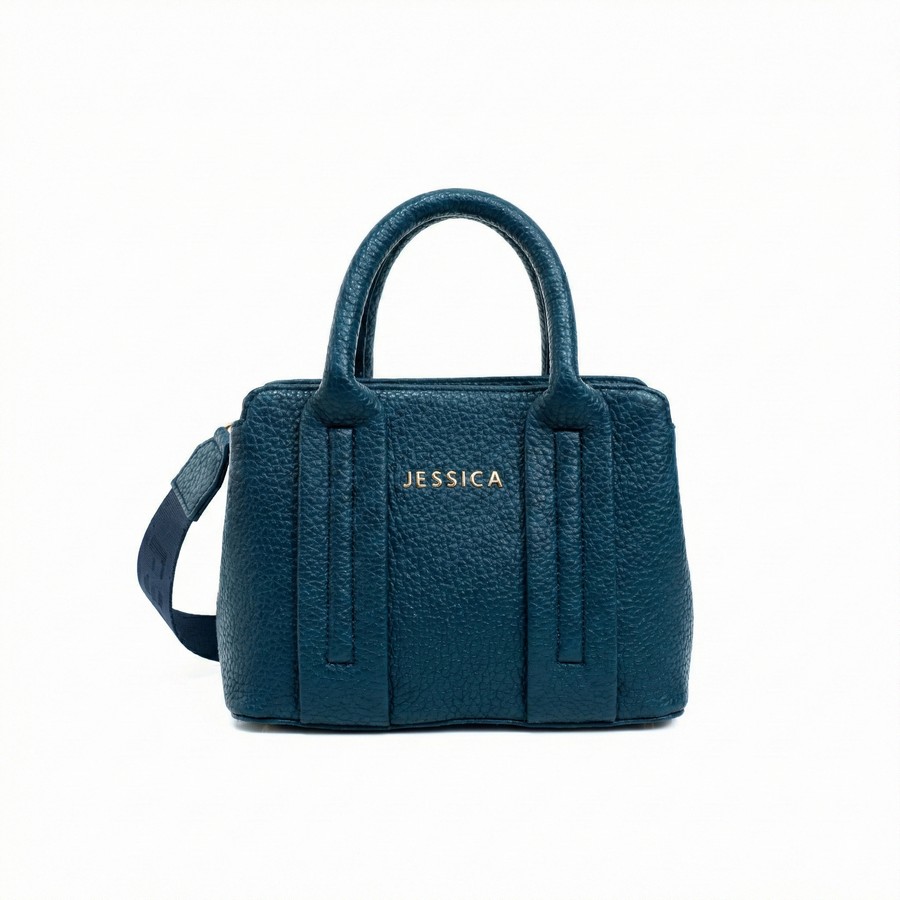 شنطة حريمي جلد إيطالي مستورد كحلي بتتشال هاند ومعاها دراع كروس ستان مقاس 18×25